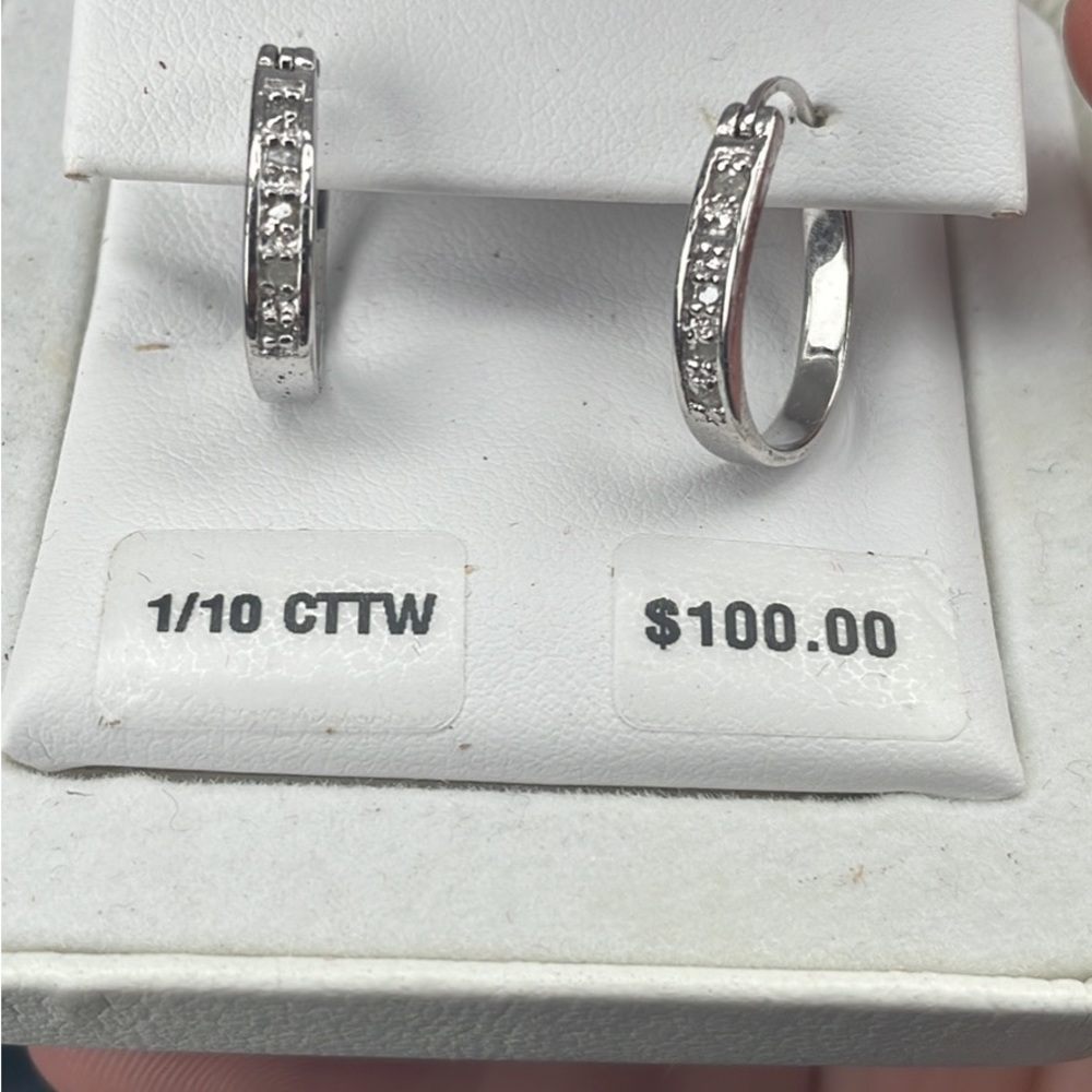 diamond earrings never worn asking for less than half the purchase price